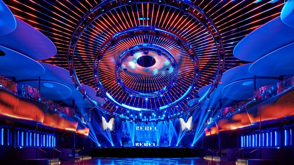 Large REBEL Toronto dance floor with circular ceiling lights Big-room club nights and waterfront concerts