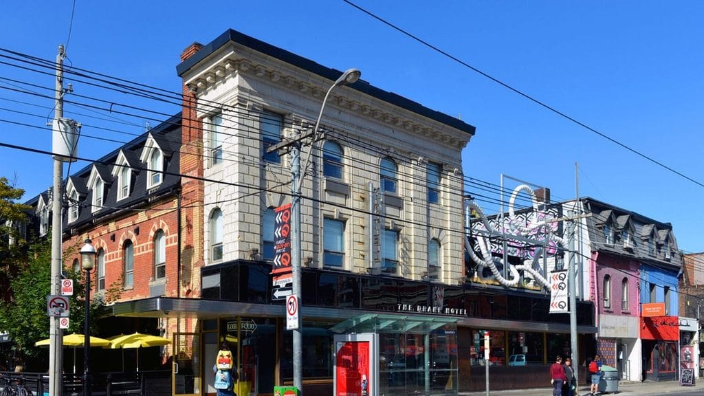 Street view of The Drake Hotel on Queen Street West Rooftop drinks, DJs and a basement music room